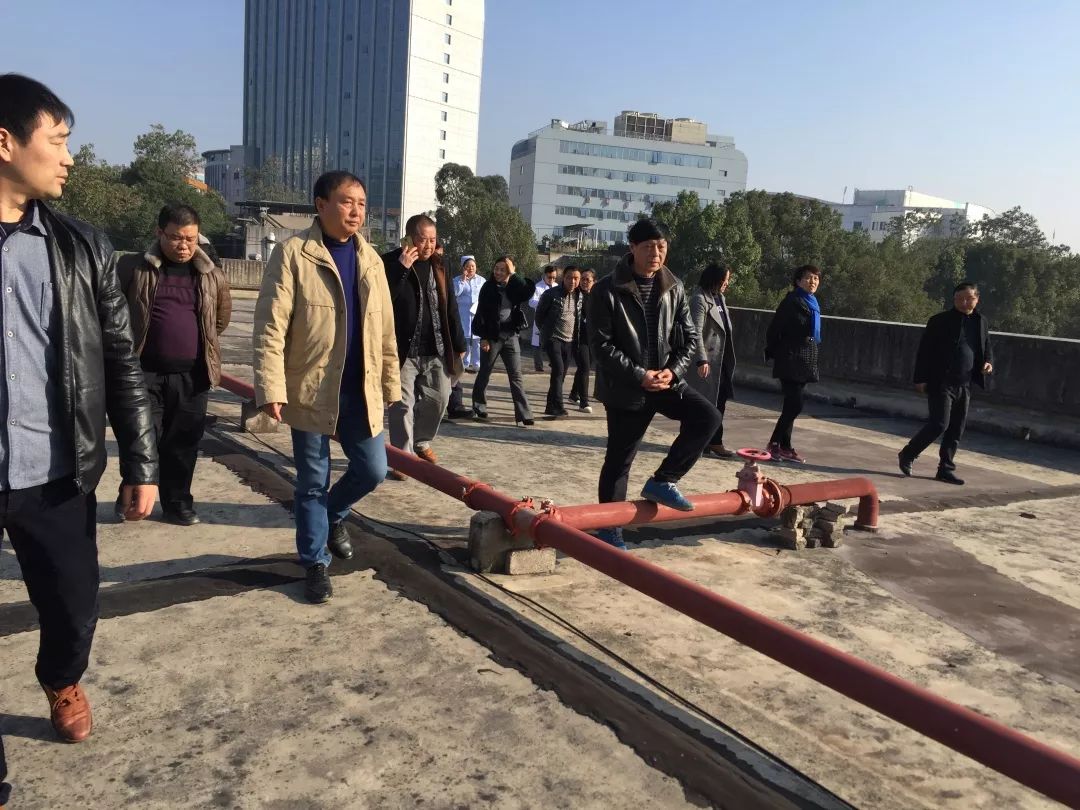 铜仁市公共资源交易中心专家组一行人深入我院开展工程竣工验收工作